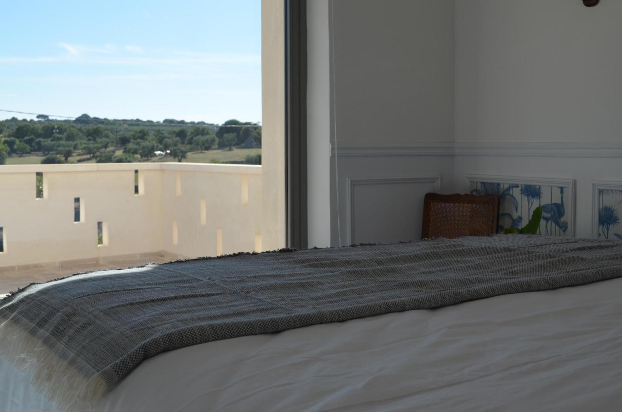 B&B Fuga Al Trullo ออสตูนี ภายนอก รูปภาพ